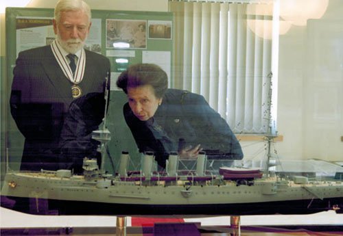 HRH Princess Anne viewing the HMS Hampshire model